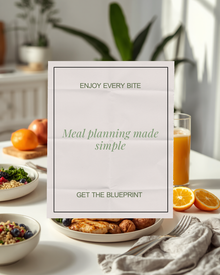 Overhead flat-lay of a colorful, real-food breakfast spread with fresh orange juice, illustrating that meal planning with the IF Blueprint stays simple and enjoyable